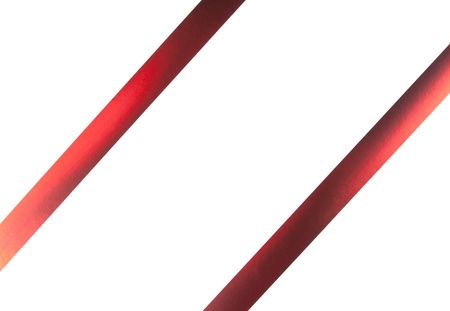 Red gift ribbons isolated on whiteの写真素材