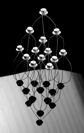 Concept of transistors acrobats pyramid on black and whiteの写真素材