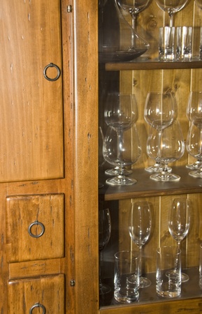 Retro wooden sideboard with glasses