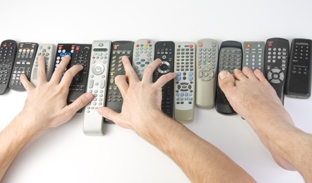 Two hands and led pushing buttons on romote controlers