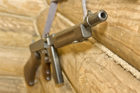 Thompson gun on the wooden wallの写真素材