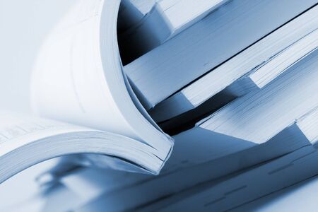 Close-up of open business catalog. Toned in blueの写真素材