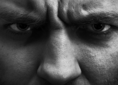 Close-up portrait of angry man. In B/Wの写真素材