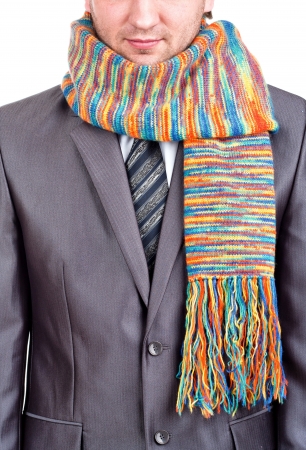 Businessman in formal grey suit and colorful scarfの写真素材