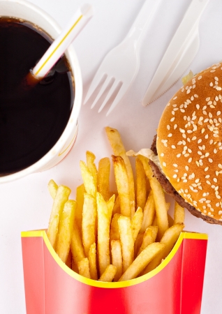 Fast food set of fried potatoes, burger and colaの写真素材