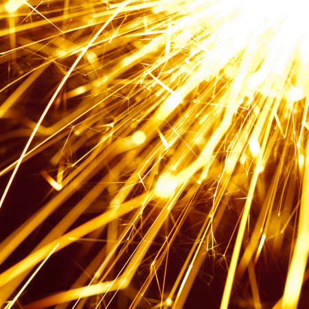 Close-up view of lit up holiday sparklerの写真素材