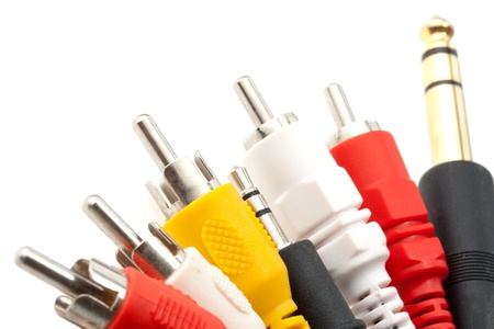 Close-up view of audio and video cables. Isolated on white