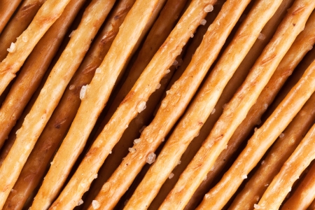 Close-up of many salted sticks. Background or textureの写真素材