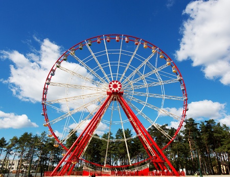Ferris wheel against blue skyの写真素材
