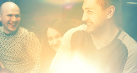 Closeup of cheerful friends. Tonedの写真素材