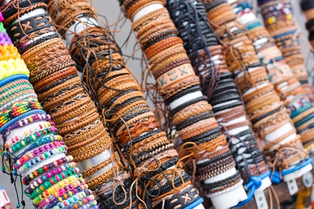 Many various leather and textile braceletsの写真素材