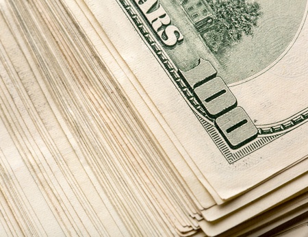 Heap of $100 dollar bills