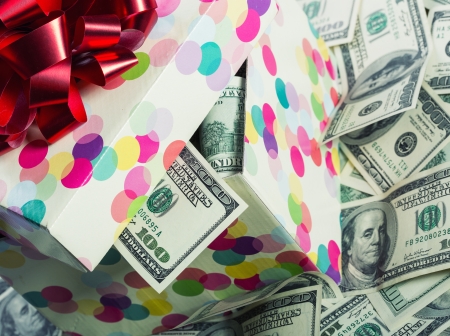 Gift box full of $100 dollar billsの写真素材