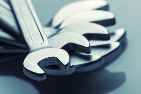 Set of open end wrenches. Toned in blueの写真素材