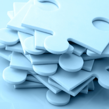 Stack of jigsaw puzzle piecesの写真素材