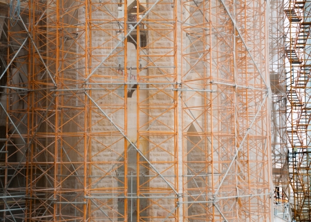 Construction site - scaffolding around new buildingの写真素材
