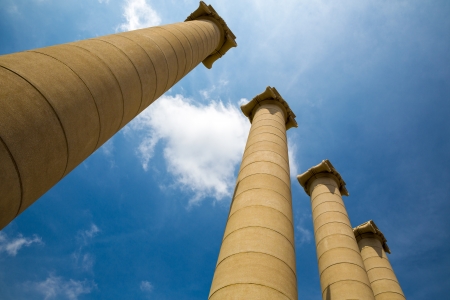 Majestic greek columns against blue skyの写真素材