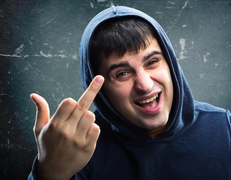 Man in hoodie with fuck off signの写真素材