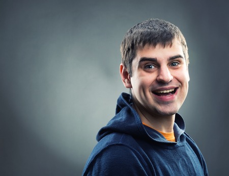 Happy man weared hoodie smilingの写真素材