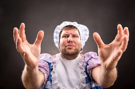 Crazy man weared as baby praying