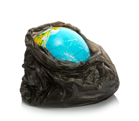 Earth inside litter pack on whiteの写真素材