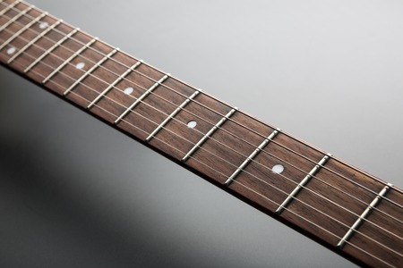 Electric guitar neck with stringsの写真素材