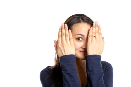 Portrait of a woman hiding with hands isolated on white
