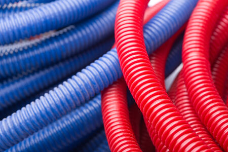 Red and blue water pipesの写真素材