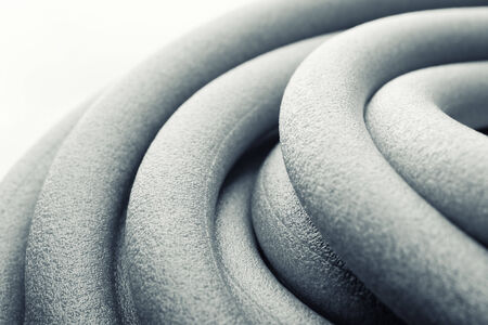 Macro of rolls of thermal insulation foam pipesの写真素材