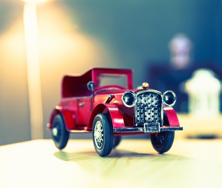 Red oldtimer vintage toy car