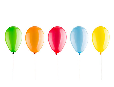 Many colorful balloons in a row isolated on whiteの写真素材