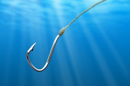 Fishing hook in the light sea