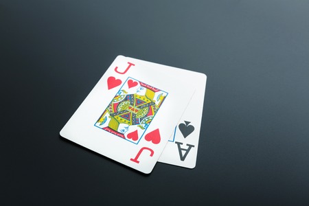 Black Jack. Two cards on grey backgroundの写真素材