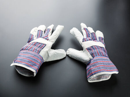 Work glove on grey background