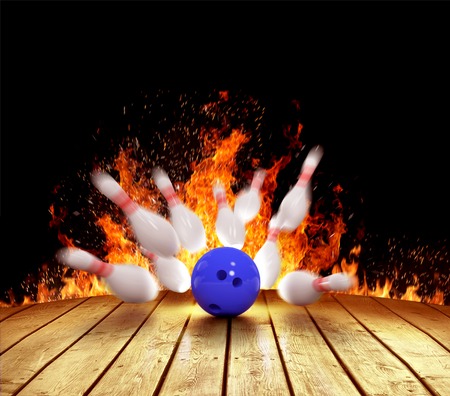 Illustration of spread skittles in the fire and bowling ball on wooden floorの写真素材