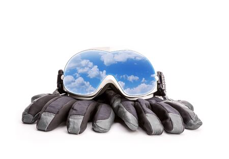 Winter sport glasses and gloves isolated on white backgroundの写真素材