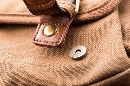 Closeup view of brown backpack buckleの写真素材