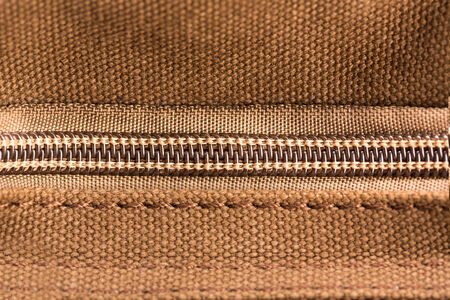 Brown texture with closed zipperの写真素材