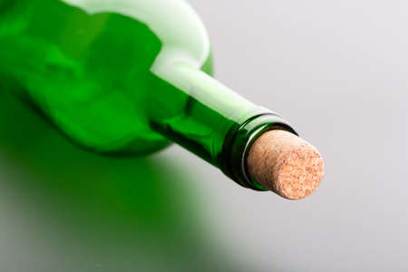 Empty wine bottle with cork closeup