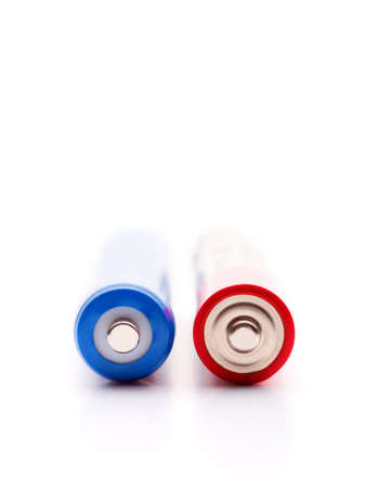 Two colourfull batteries isolated on white