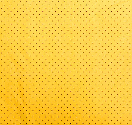 Yellow suede texture with spotsの写真素材