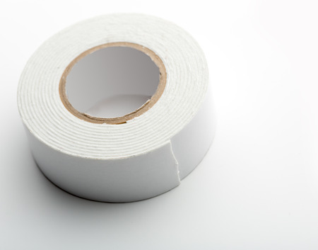 Closeup of white industrial tape isolated on whiteの写真素材