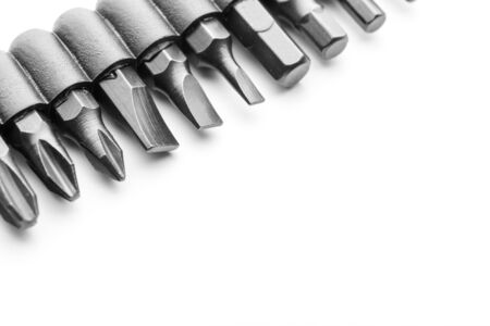 Macro of screwdriver bits on whiteの写真素材