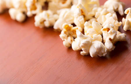 Popcorn on the wooden tableの写真素材