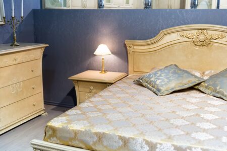 Classical interior of bedroom. Closeup of bedの写真素材