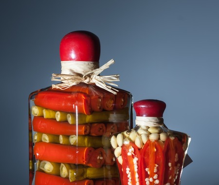 Two jars of pickled haricot and other vegetablesの写真素材