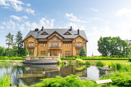 Novi Petrivtsi, Ukraine - May 27, 2015 Mezhigirya residence of ex-president of Ukraine Yanukovich. "Khonka" house exteriorのeditorial素材