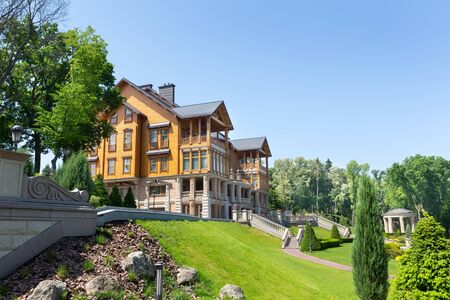 Novi Petrivtsi, Ukraine - May 27, 2015 Mezhigirya residence of ex-president of Ukraine Yanukovich. "Khonka" house on the hill exteriorのeditorial素材