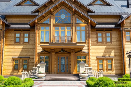 Novi Petrivtsi, Ukraine - May 27, 2015 Mezhigirya residence of ex-president of Ukraine Yanukovich.  Facade of the "Khonka" houseのeditorial素材