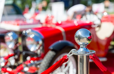 Metal column of enclosure on car exhibition